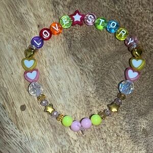 5 for $10 Taylor Swift Handmade Friendship Beaded Bracelet
“Love Story”